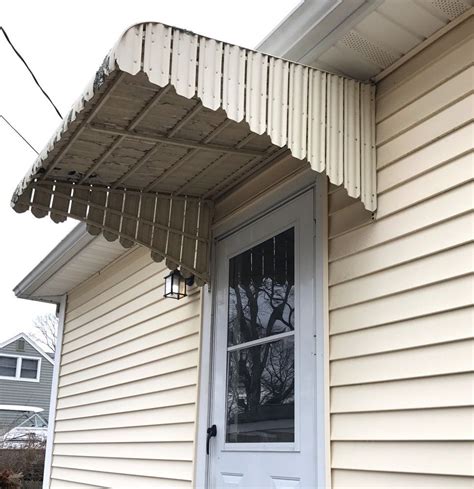 removing metal roof awnings